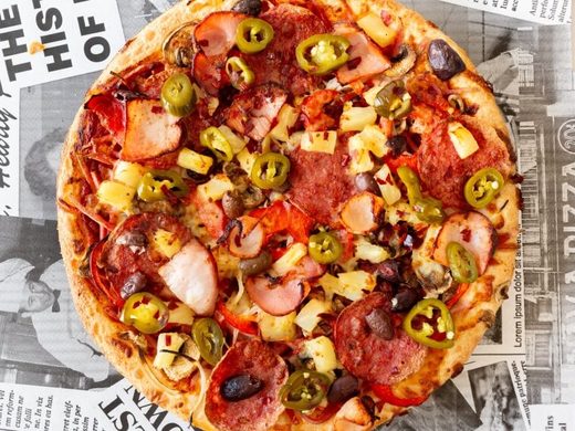 Hot The Lot pizza loaded with hot salami, jalapeños, capsicum, olives and pineapple